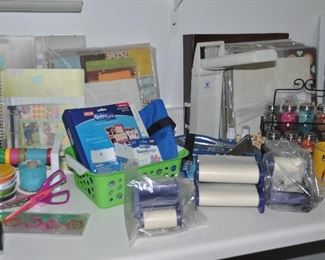 Several sets of QuicKutz Personal Die-Cutting, Xyron cartridges, more scrapbook-making kits, Daylight work lamps