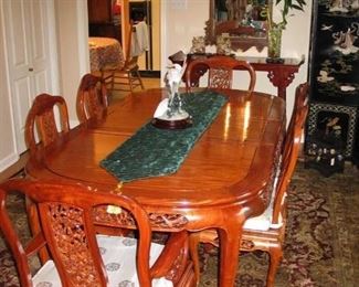 Rosewood Dining table with 2 ext. Leaves
Dimension: W42" x D80" x H30"
2 -Rosewood dining arm chair
6-Rosewood Dining Side Chair
Purchased in Hong Kong in 1992 at Far Eastern Furnishing LTD.
Hand carved table and chair set