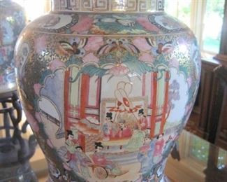A large pair of Chinese Temple Jars with Foo Dog Lids.