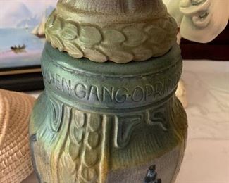 Danish urn with cover. Den Sonderjydske Vase made by Ove Jorgensen. The words say, “Don’t give up, One morning the sun will raise to freedom!”
