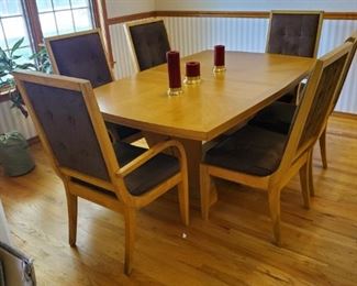 You need to see this dining set in person.  It is in remarkable condition, and we have it priced well below the value