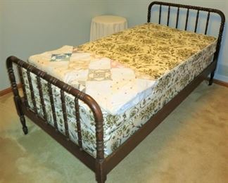Antique twin size Jenny Lind bed, vintage quilt