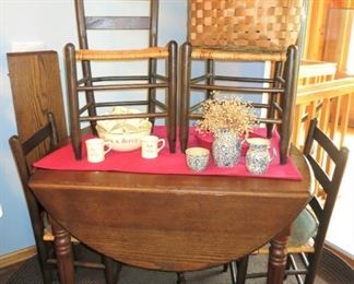 Early to mid 1800's drop down table showing 4 of 6 ladder back chair w/ woven seats, Tom & Jerry eggnog set, spongeware collectibles, woven basket