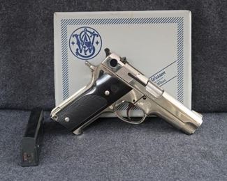 Smith & Wesson Model 59, Nickel Finish, 4" BBL, 2 Mags, 9mm                                                                                           
Very Good Condition In Original Box.