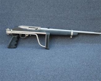 AMT Model 25/22 Lightning, Stainless Steel, Folding Stock, 25 RD Mag.,                                                                            Like New With Original Padded Case (Not Pictured).