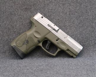 Taurus PT-111 G2, Custom Cerakote OD Green Frame, Extra Magazine, 9mm                                                                                                Condition Is Very Good In Original Box (Not Pictured).
