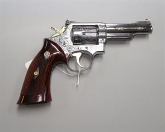 Smith & Wesson Model 66-1, Deep Relief Engraving, 4" bbl, Polished Stainless Steel, .357 Magnum                                            Condition is excellent.