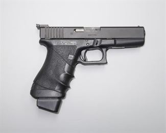 Glock 21 Pistol, Target Sights, Hogue Wrap-Around Grip, .45ACP                                                                                                         Condition is excellent.