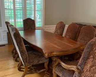 Havertys formal dining table and eight chairs, two table leaf extensions and custom table pad.