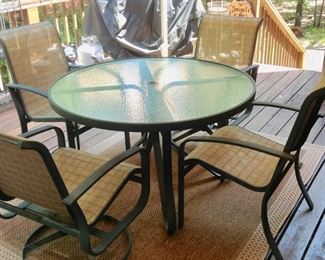 Patio Table w/4 Chairs (2 are Swivel), and an Outdoor Rug