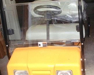 Cricket Resort Style Golf Cart.  Like New!  Still has the plastic on the seats.  Electric, new tires, 2 Batteries