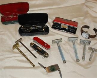 Antique eyeglasses, clamshell razors, opera glasses, pocket knives, WWI timepiece