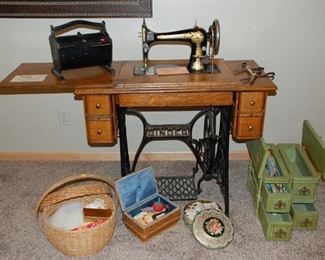 Singer sewing machine and vintage sewing baskets