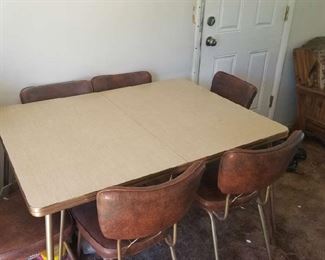 Mid-century table and chairs in excellent condition