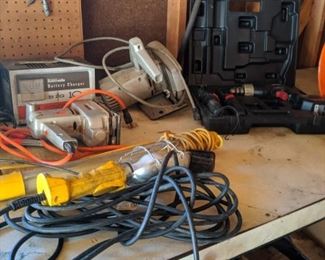Some power tools, shop lights, and extension cords.