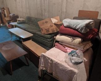 Blankets, roll away beds x 2, Old couch, shelf unit