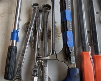 Saws, tire irons, some craftsman tools
