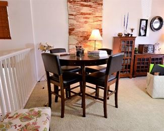 Black high top table and 4 chairs.