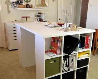 Extra large work table can be used for sewing/crafts/office you name it. Great storage on both sides.