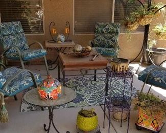 Patio rugs for sale along with lots of outdoor furniture.