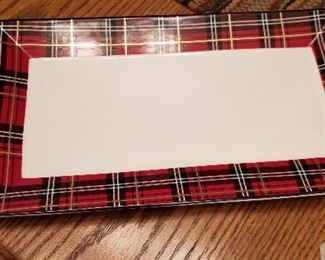 Tartan holiday dishes for sale.  Did you know tartan is a pattern consisting of criss-crossed horizontal and vertical bands in multiple colors. ... Tartan is often mistakenly called "plaid" (particularly in the United States), but in Scotland, a plaid is a large piece of tartan cloth, worn as a type of kilt or large shawl?