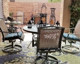 Patio table and chairs for sale. Outdoor rugs also for sale.