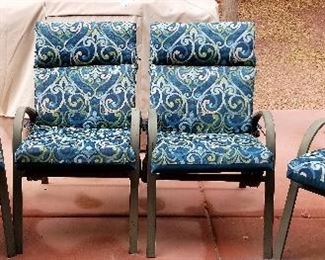 More outdoor patio chairs with beautiful cushions.