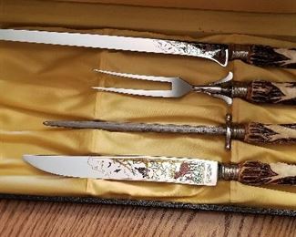 Very unique carving set with stags. Gorgeous!