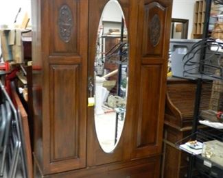 Large wardrobe with drawer at bottom