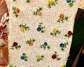 We all fell in love with this c 1953 evening top: All lined wool shell with ivory colored sequins accented with hand set beaded flowers, Truly exquisite about a size 8-10