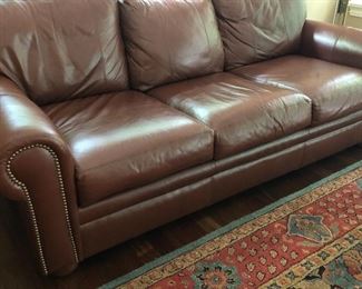 3-CUSHION LEATHER SOFA WITH NAIL-HEAD TRIM ON ARMS - excellent condition
