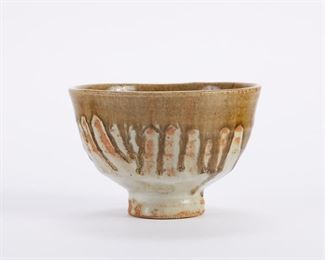 Warren MacKenzie (1924-2018). Studio pottery ceramic bowl. Stoneware with olive green drip glaze. Marked along the footrim. Warren MacKenzie was a renowned Minnesota studio potter. A student of Bernard Leach and Shoji Hamada, he is credited with bringing the functional Mingei tradition to the United States, and spreading it through his own art and mentorship of students during his long tenure at the University of Minnesota. Note: Lots 1-19 were purchased by a single collector from MacKenzie's showroom between 1989-2000
SKU: 01408
Follow us on Instagram: @revereauctions