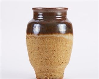 Warren MacKenzie (1924-2018). Studio pottery vase. Stoneware with brown and tan glaze. Marked along the footrim. Warren MacKenzie was a renowned Minnesota studio potter. A student of Bernard Leach and Shoji Hamada, he is credited with bringing the functional Mingei tradition to the United States, and spreading it through his own art and mentorship of students during his long tenure at the University of Minnesota. Note: Lots 1-19 were purchased by a single collector from MacKenzie's showroom between 1989-2000
SKU: 01400
Follow us on Instagram: @revereauctions