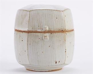 Warren MacKenzie (1924-2018). Lidded studio pottery ceramic box with a combed, cut-sided design. Glazed stoneware. Marked along the footrim. Warren MacKenzie was a renowned Minnesota studio potter. A student of Bernard Leach and Shoji Hamada, he is credited with bringing the functional Mingei tradition to the United States, and spreading it through his own art and mentorship of students during his long tenure at the University of Minnesota. Note: Lots 1-19 were purchased by a single collector from MacKenzie's showroom between 1989-2000
SKU: 01399
Follow us on Instagram: @revereauctions