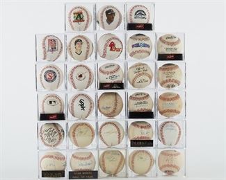 Large group of signed, unsigned, commemorative, and game used baseballs. The signed balls include Stan Musial, Cal Ripken Jr and Sachio Kinugasa "Consecutive Games Streak of the World," John McNamara, Nolan Ryan, Sandy Koufax, and Bob Feller. There is also a large group of commemorative balls with facsimile signatures and some game used balls. 
SKU: 01211
Follow us on Instagram: @revereauctions