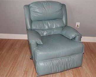 74. Blue Leather Swiveling Recliner Armchair
