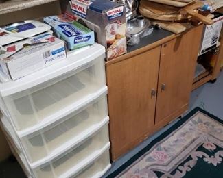 More kitchen items -- meat slicer in original box, cutting boards, storage cabinets