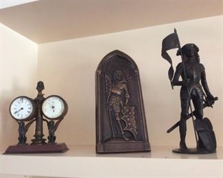 Brass clock, religious/saint plaque and statue 