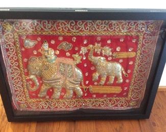 Indonesian fabric art in shadow box 