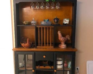 Bakers rack with curious basket of white porcelain pears