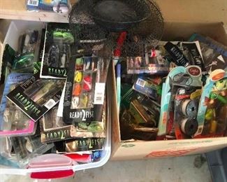 A whole mess of fishing lures still in their packaging.