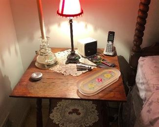 primitive side table topped with boudoir lamps