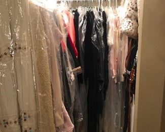 So much designer clothing! Many still with tags!