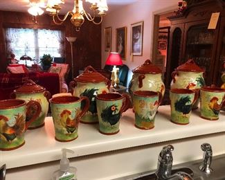 A serious collection of rooster-themed mugs