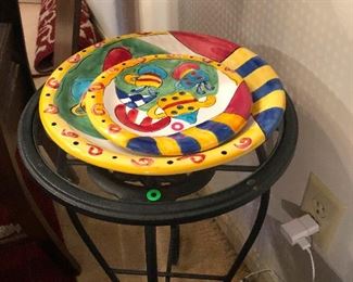 fun jazzy looking plate duo and swirly footed accent table
