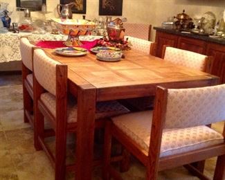 Dining table with eight chairs and extension leaf