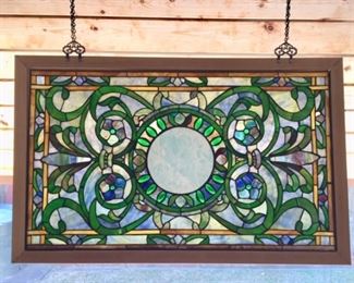 Framed stained glass panel