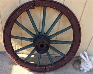 One of three antique wagon wheels