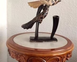One of two carved plant stands