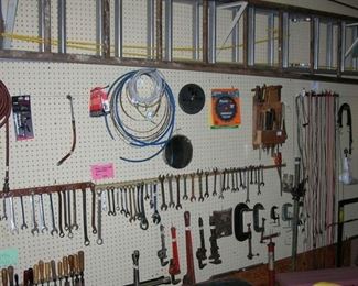 ladders, tools, chisels, clamps, wrenches
